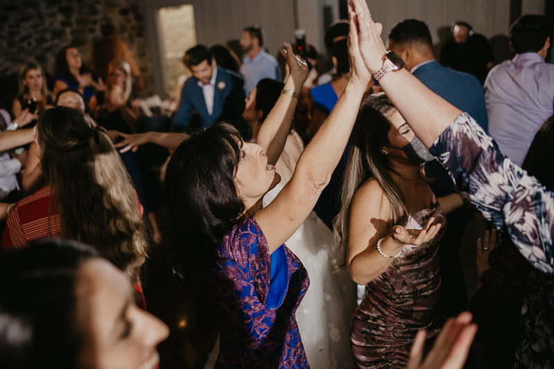 An exciting evening wedding reception by DJ Drew Albins from BMore for the Record at Main Street Ballroom in Ellicott City, Maryland by Britney Clause Photography