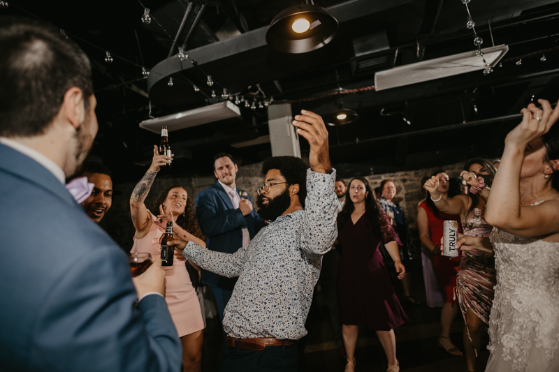 An exciting evening wedding reception by DJ Drew Albins from BMore for the Record at Main Street Ballroom in Ellicott City, Maryland by Britney Clause Photography