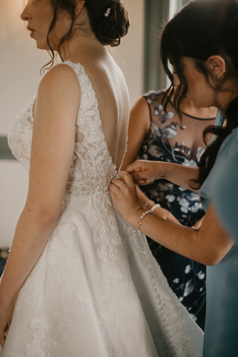 A bride getting ready at Dulany's Overlook in Frederick, Maryland by Britney Clause Photography