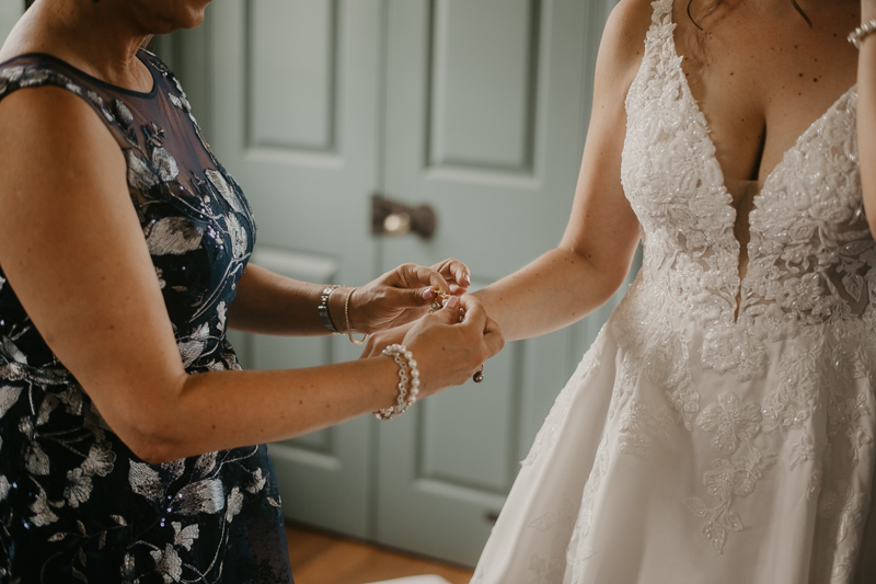 A bride getting ready at Dulany's Overlook in Frederick, Maryland by Britney Clause Photography