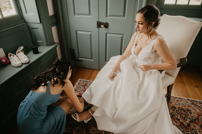 A bride getting ready at Dulany's Overlook in Frederick, Maryland by Britney Clause Photography