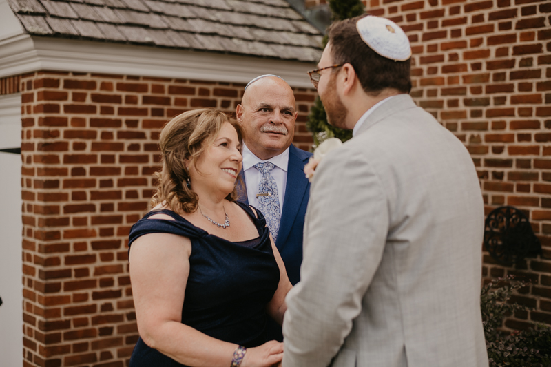 A groom getting ready at Dulany's Overlook in Frederick, Maryland by Britney Clause Photography