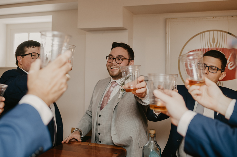 A groom getting ready at Dulany's Overlook in Frederick, Maryland by Britney Clause Photography