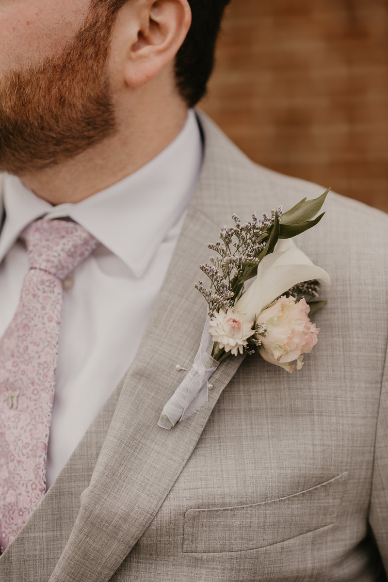 A groom getting ready at Dulany's Overlook in Frederick, Maryland by Britney Clause Photography