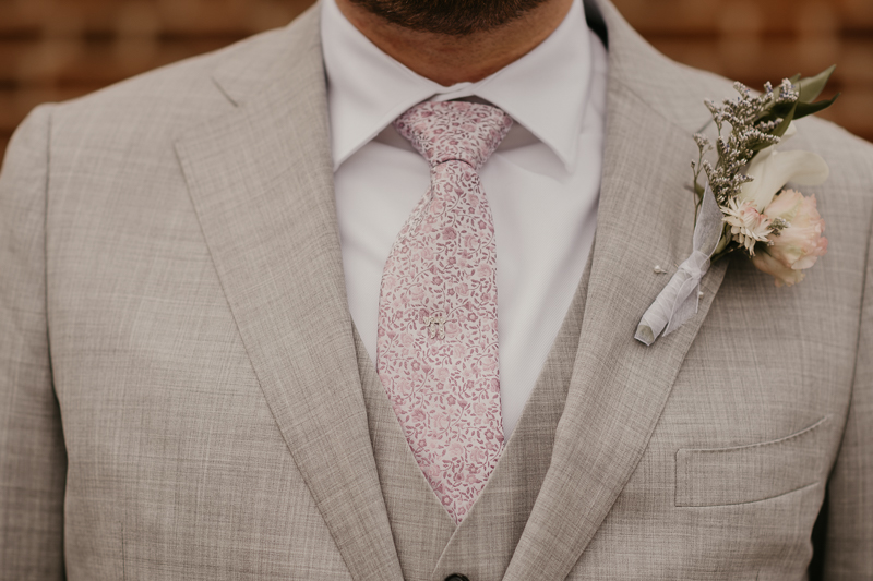 A groom getting ready at Dulany's Overlook in Frederick, Maryland by Britney Clause Photography