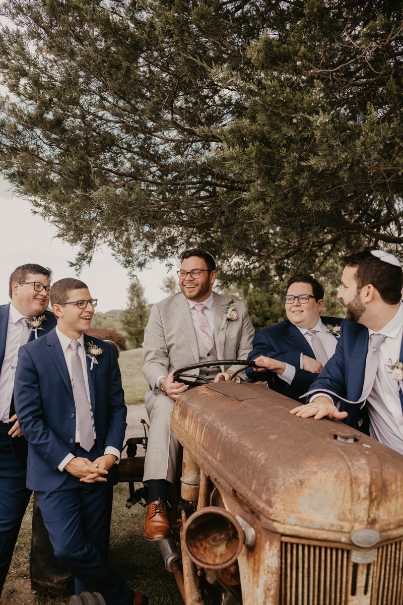 A groom getting ready at Dulany's Overlook in Frederick, Maryland by Britney Clause Photography