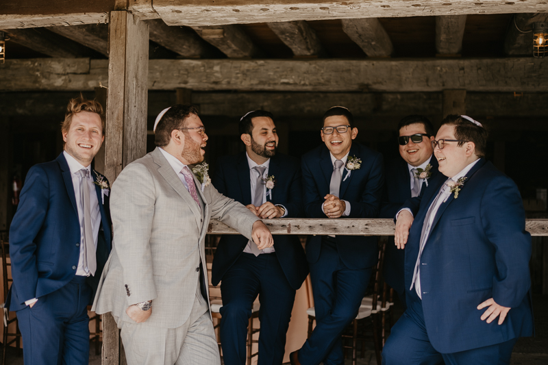 A groom getting ready at Dulany's Overlook in Frederick, Maryland by Britney Clause Photography