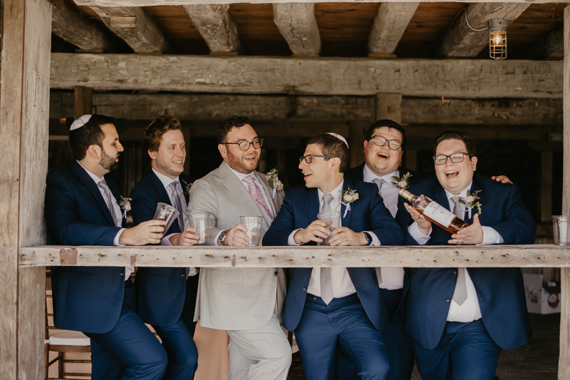 A groom getting ready at Dulany's Overlook in Frederick, Maryland by Britney Clause Photography