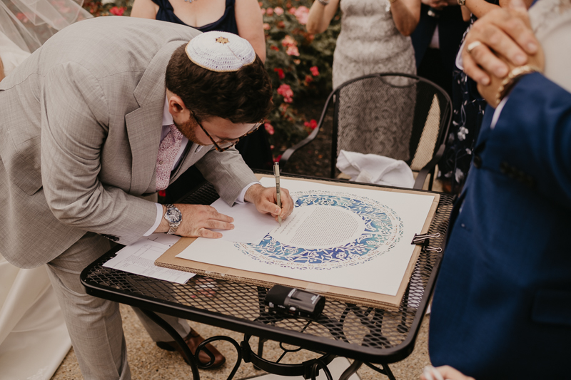 A lively Ketubah signing in the Dulany's Overlook Rose Garden in Frederick, Maryland by Britney Clause Photography