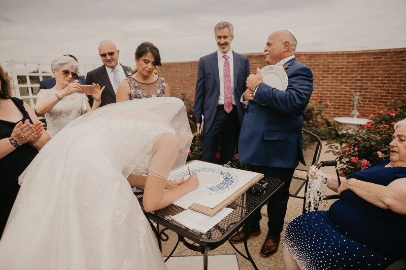 A lively Ketubah signing in the Dulany's Overlook Rose Garden in Frederick, Maryland by Britney Clause Photography