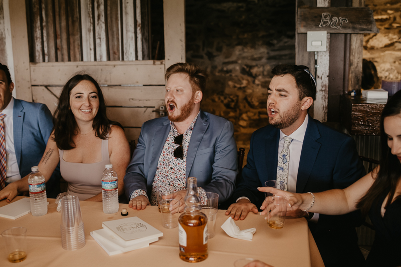 A lively Ketubah signing in the Dulany's Overlook Rose Garden in Frederick, Maryland by Britney Clause Photography