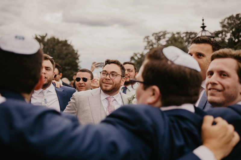 A lively Ketubah signing in the Dulany's Overlook Rose Garden in Frederick, Maryland by Britney Clause Photography