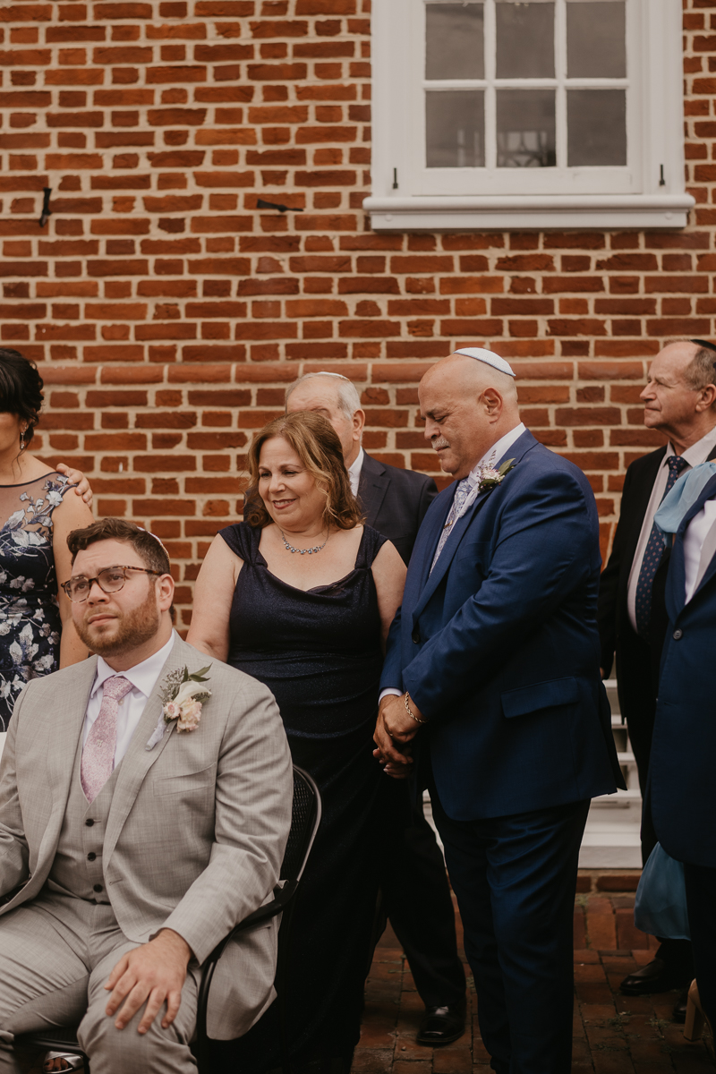 A lively Ketubah signing in the Dulany's Overlook Rose Garden in Frederick, Maryland by Britney Clause Photography