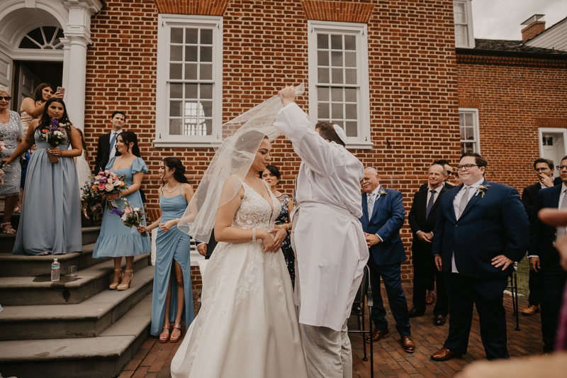 A lively Ketubah signing in the Dulany's Overlook Rose Garden in Frederick, Maryland by Britney Clause Photography