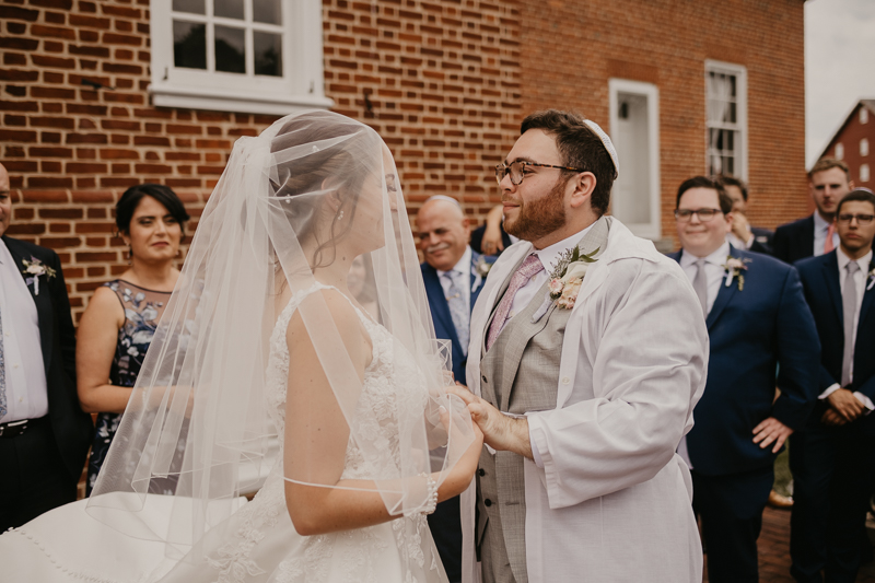 A lively Ketubah signing in the Dulany's Overlook Rose Garden in Frederick, Maryland by Britney Clause Photography