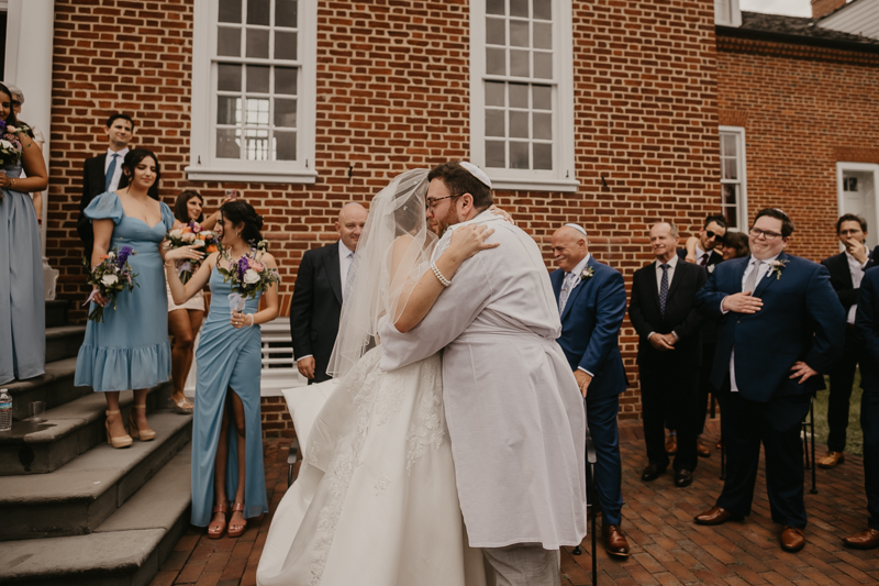 A lively Ketubah signing in the Dulany's Overlook Rose Garden in Frederick, Maryland by Britney Clause Photography