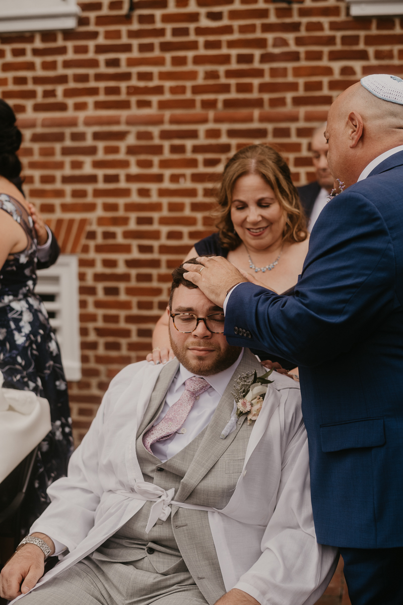 A lively Ketubah signing in the Dulany's Overlook Rose Garden in Frederick, Maryland by Britney Clause Photography