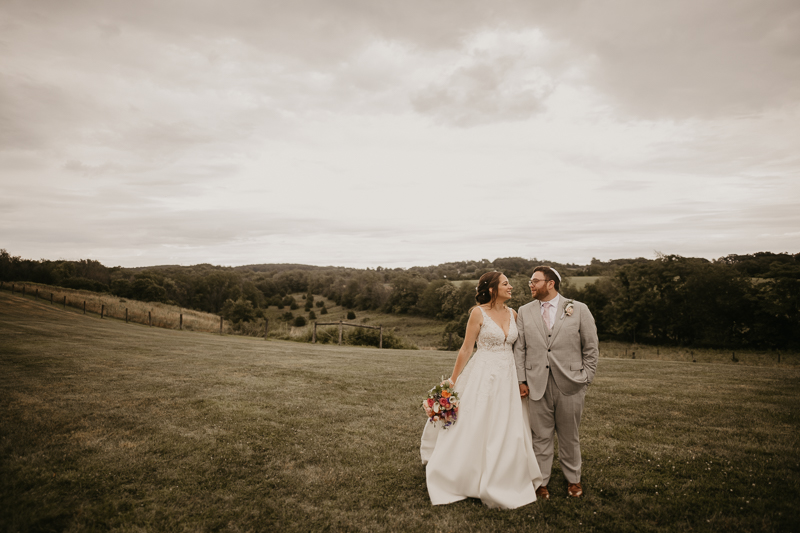 Stunning bride and groom wedding portraits at Dulany's Overlook in Frederick, Maryland by Britney Clause Photography