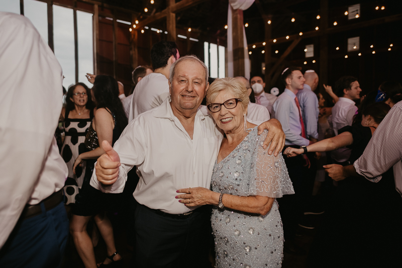 An exciting evening wedding reception by Purnell from Washington Talent at Dulany's Overlook in Frederick, Maryland by Britney Clause Photography