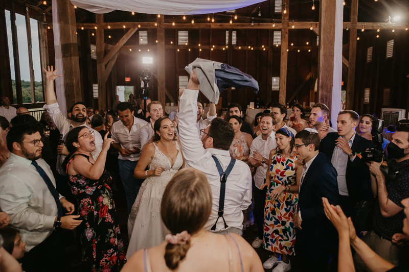 An exciting evening wedding reception by Purnell from Washington Talent at Dulany's Overlook in Frederick, Maryland by Britney Clause Photography