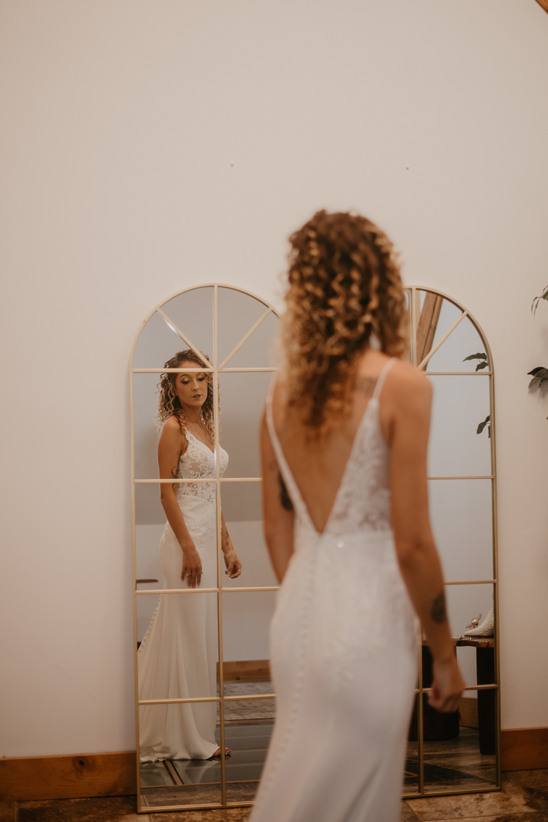 A bride getting ready at Castle Farm in Snow Hill, Maryland by Britney Clause Photography