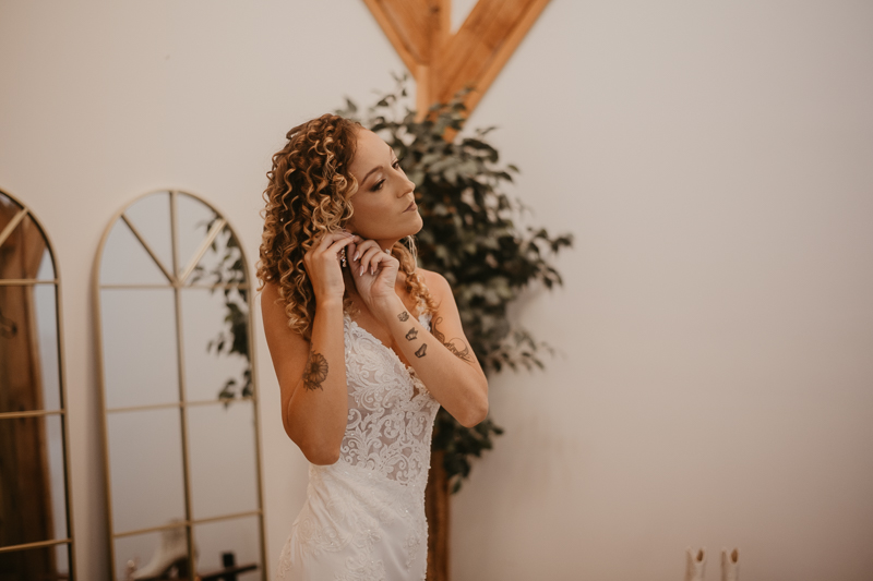 A bride getting ready at Castle Farm in Snow Hill, Maryland by Britney Clause Photography