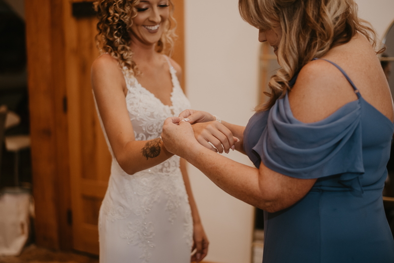 A bride getting ready at Castle Farm in Snow Hill, Maryland by Britney Clause Photography