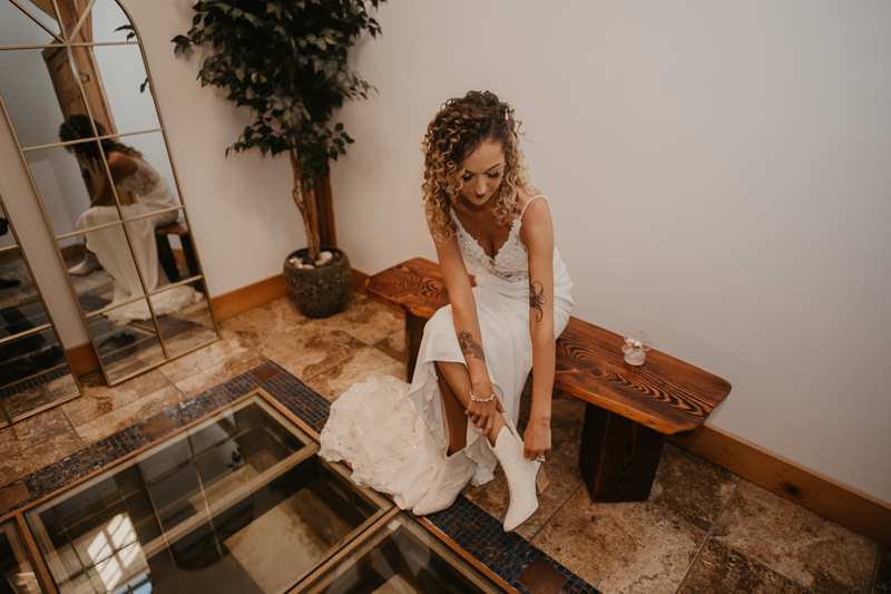 A bride getting ready at Castle Farm in Snow Hill, Maryland by Britney Clause Photography