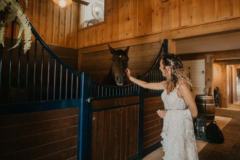 A bride getting ready at Castle Farm in Snow Hill, Maryland by Britney Clause Photography