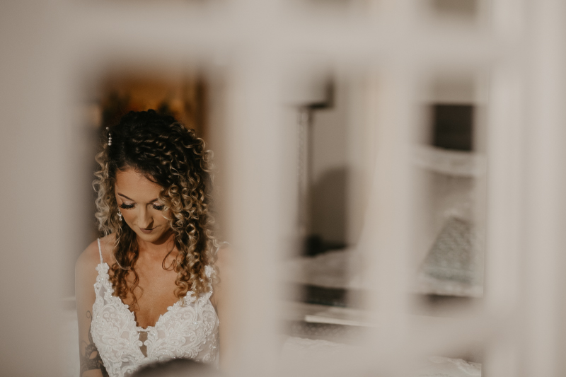 A bride getting ready at Castle Farm in Snow Hill, Maryland by Britney Clause Photography