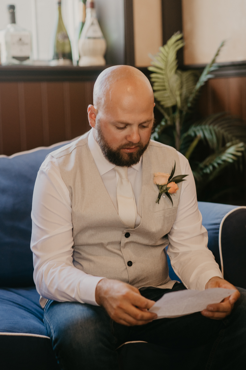 A groom getting ready at Castle Farm in Snow Hill, Maryland by Britney Clause Photography