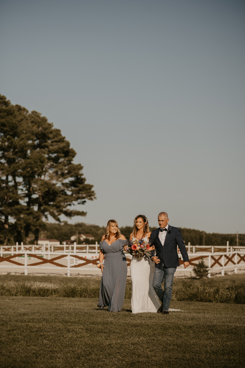 Amazing boho country wedding ceremony at Castle Farm in Snow Hill, Maryland by Britney Clause Photography