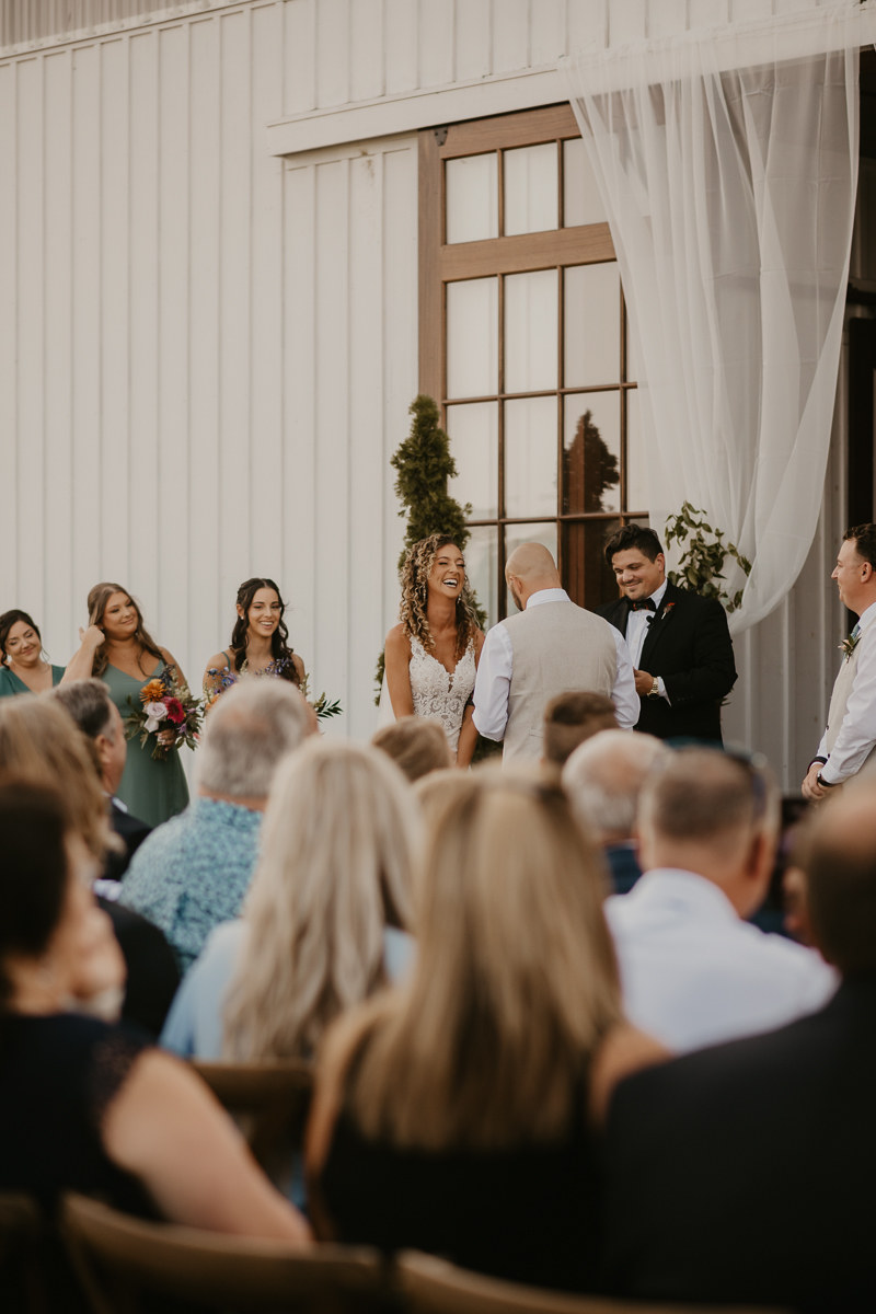 Amazing boho country wedding ceremony at Castle Farm in Snow Hill, Maryland by Britney Clause Photography