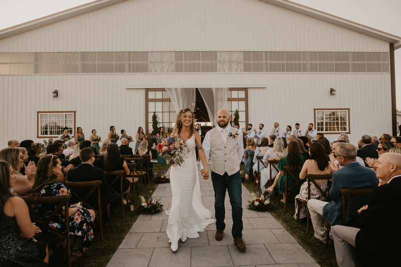 Amazing boho country wedding ceremony at Castle Farm in Snow Hill, Maryland by Britney Clause Photography