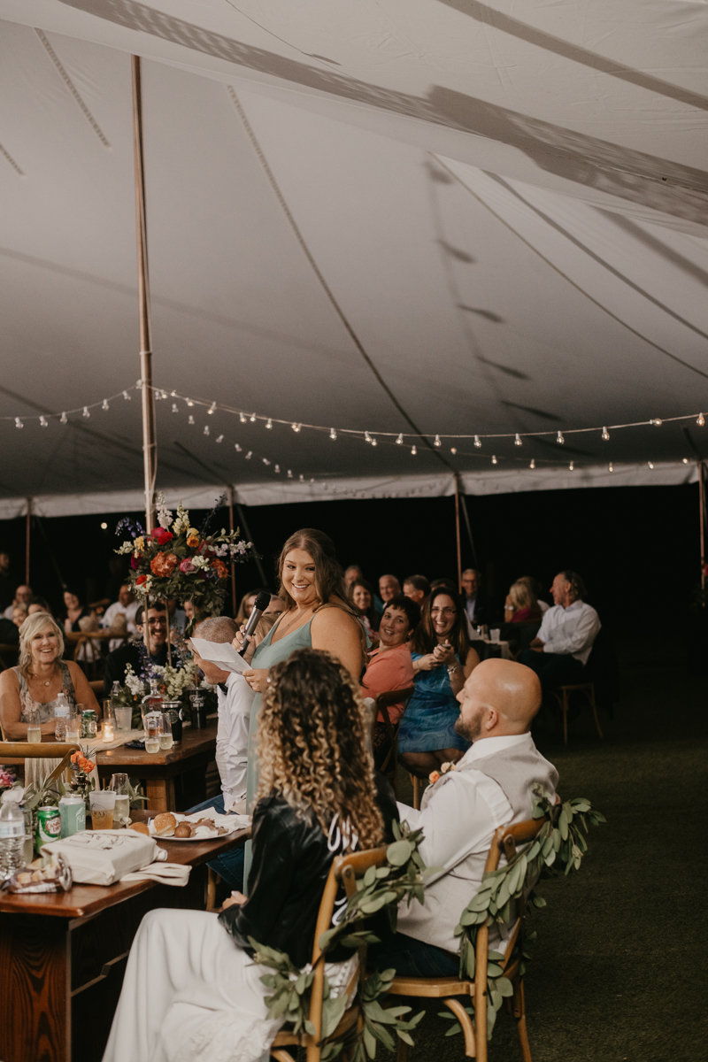 A stunning boho country wedding reception at Castle Farm in Snow Hill, Maryland by Britney Clause Photography