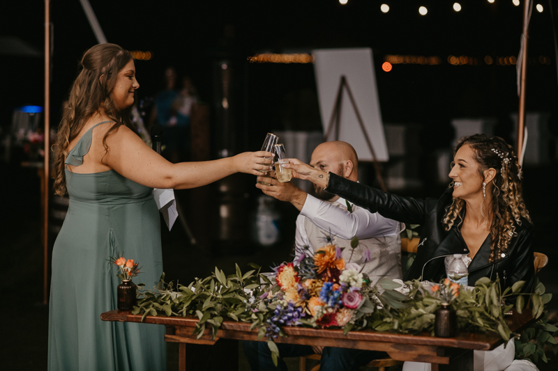 A stunning boho country wedding reception at Castle Farm in Snow Hill, Maryland by Britney Clause Photography