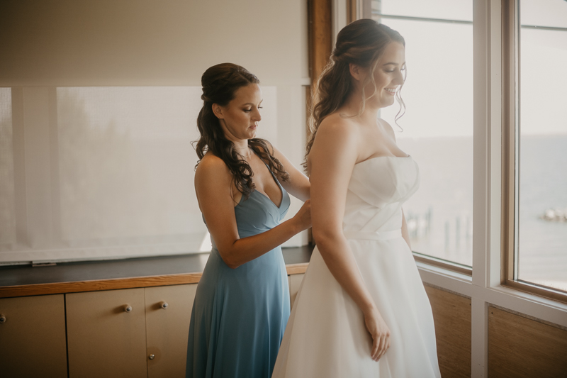 A bride getting ready at the Chesapeake Bay Foundation in Annapolis Maryland by Britney Clause Photography