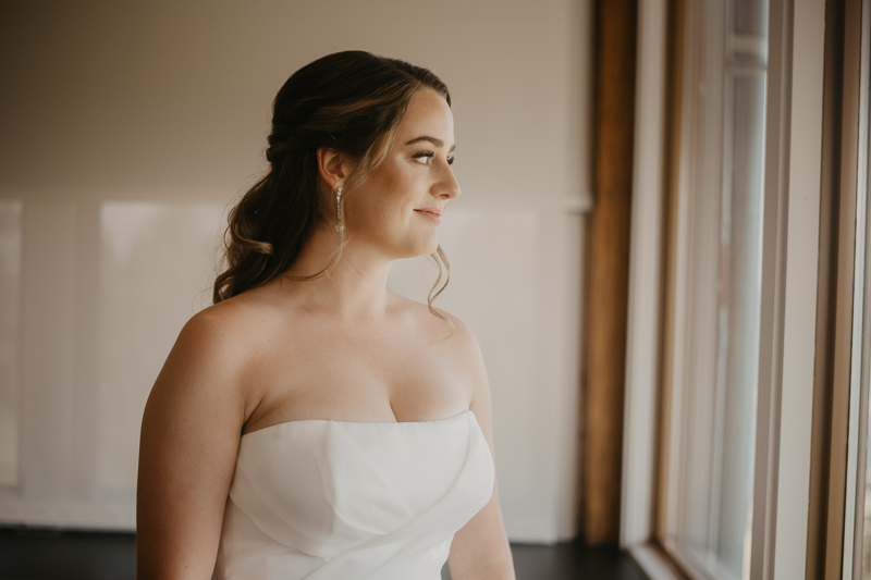 A bride getting ready at the Chesapeake Bay Foundation in Annapolis Maryland by Britney Clause Photography
