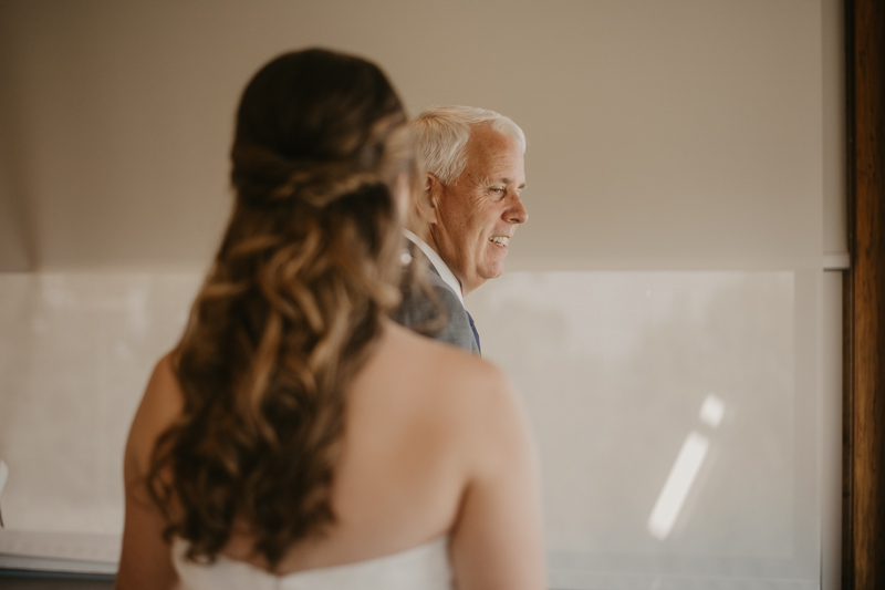 A bride getting ready at the Chesapeake Bay Foundation in Annapolis Maryland by Britney Clause Photography