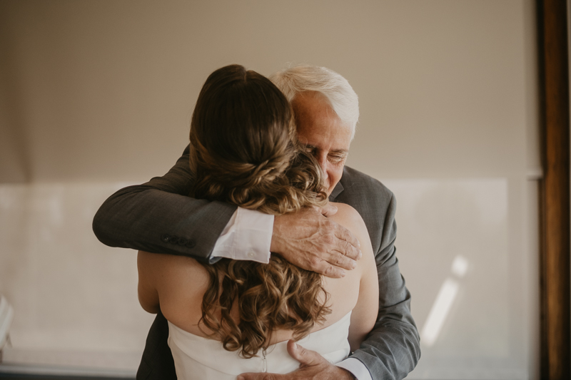 A bride getting ready at the Chesapeake Bay Foundation in Annapolis Maryland by Britney Clause Photography