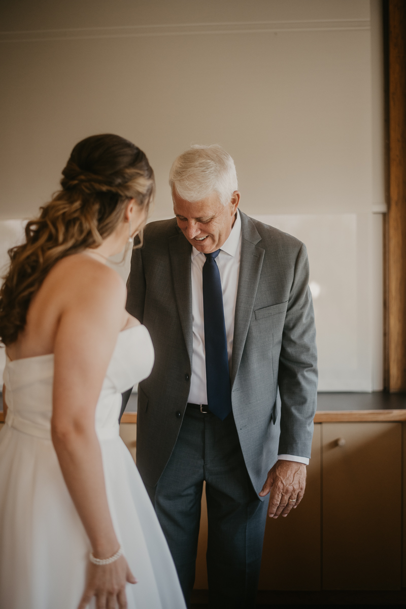 A bride getting ready at the Chesapeake Bay Foundation in Annapolis Maryland by Britney Clause Photography