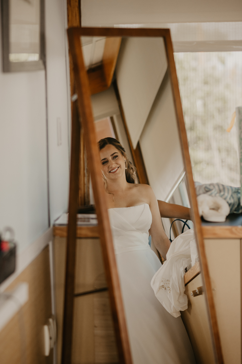 A bride getting ready at the Chesapeake Bay Foundation in Annapolis Maryland by Britney Clause Photography