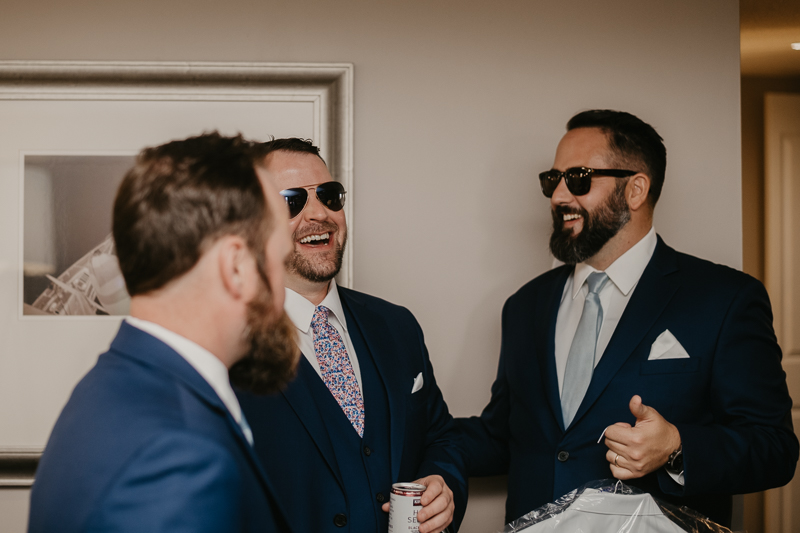 A groom getting ready at the Chesapeake Bay Foundation in Annapolis Maryland by Britney Clause Photography