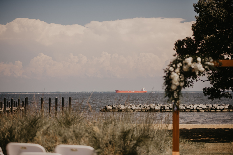 Amazing summer waterfront wedding ceremony at the Chesapeake Bay Foundation in Annapolis Maryland by Britney Clause Photography