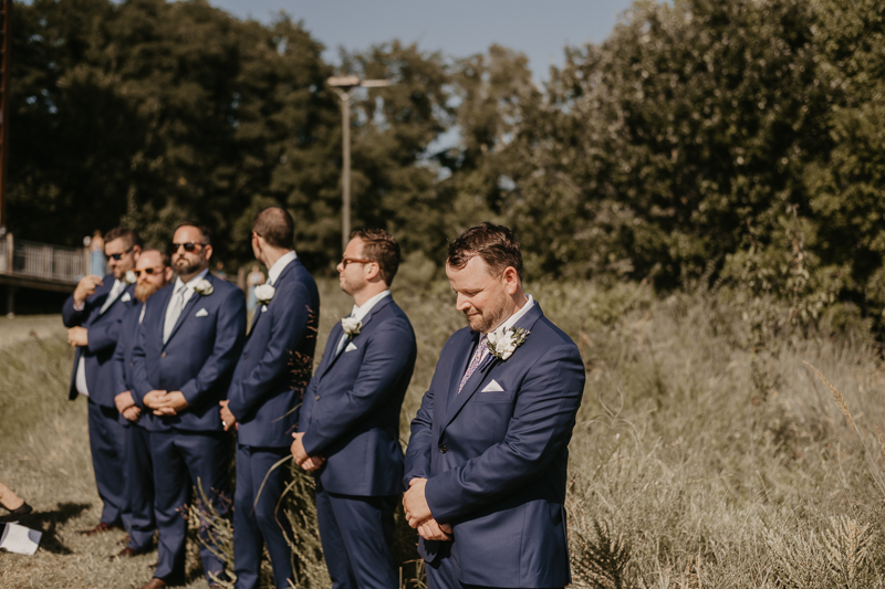 Amazing summer waterfront wedding ceremony at the Chesapeake Bay Foundation in Annapolis Maryland by Britney Clause Photography