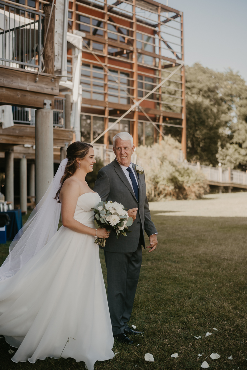 Amazing summer waterfront wedding ceremony at the Chesapeake Bay Foundation in Annapolis Maryland by Britney Clause Photography