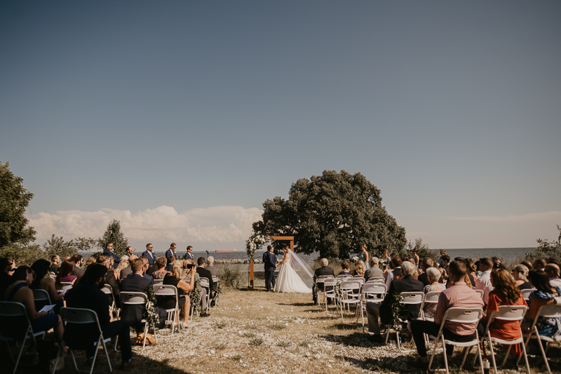 Amazing summer waterfront wedding ceremony at the Chesapeake Bay Foundation in Annapolis Maryland by Britney Clause Photography