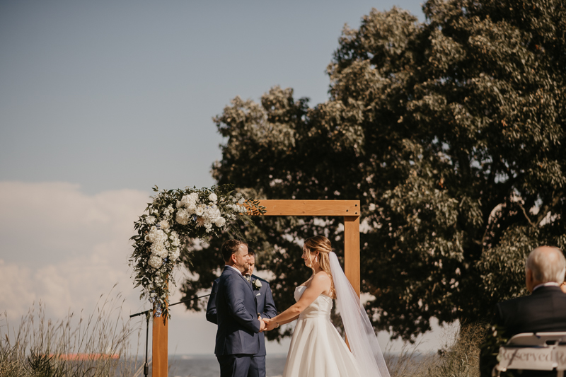 Amazing summer waterfront wedding ceremony at the Chesapeake Bay Foundation in Annapolis Maryland by Britney Clause Photography