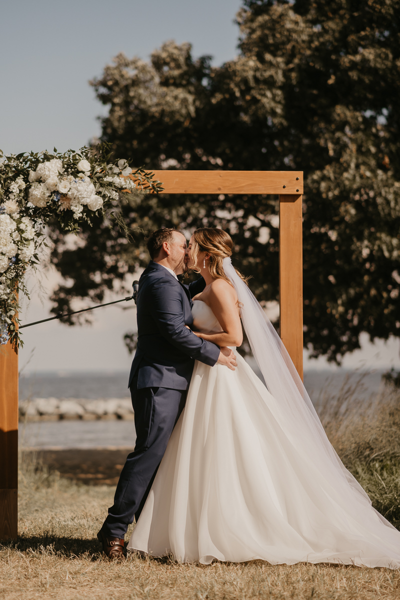 Amazing summer waterfront wedding ceremony at the Chesapeake Bay Foundation in Annapolis Maryland by Britney Clause Photography