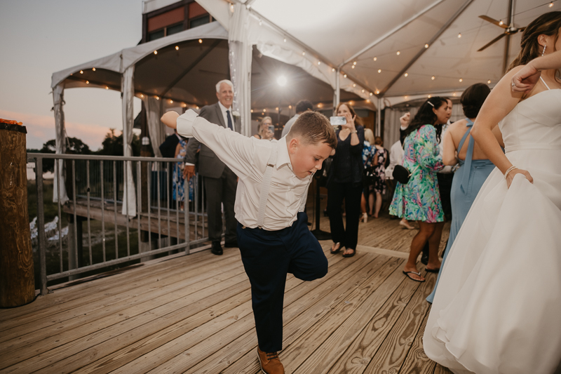 An exciting evening wedding reception by DJ Premonition from Mixing Maryland at the Chesapeake Bay Foundation in Annapolis Maryland by Britney Clause Photography